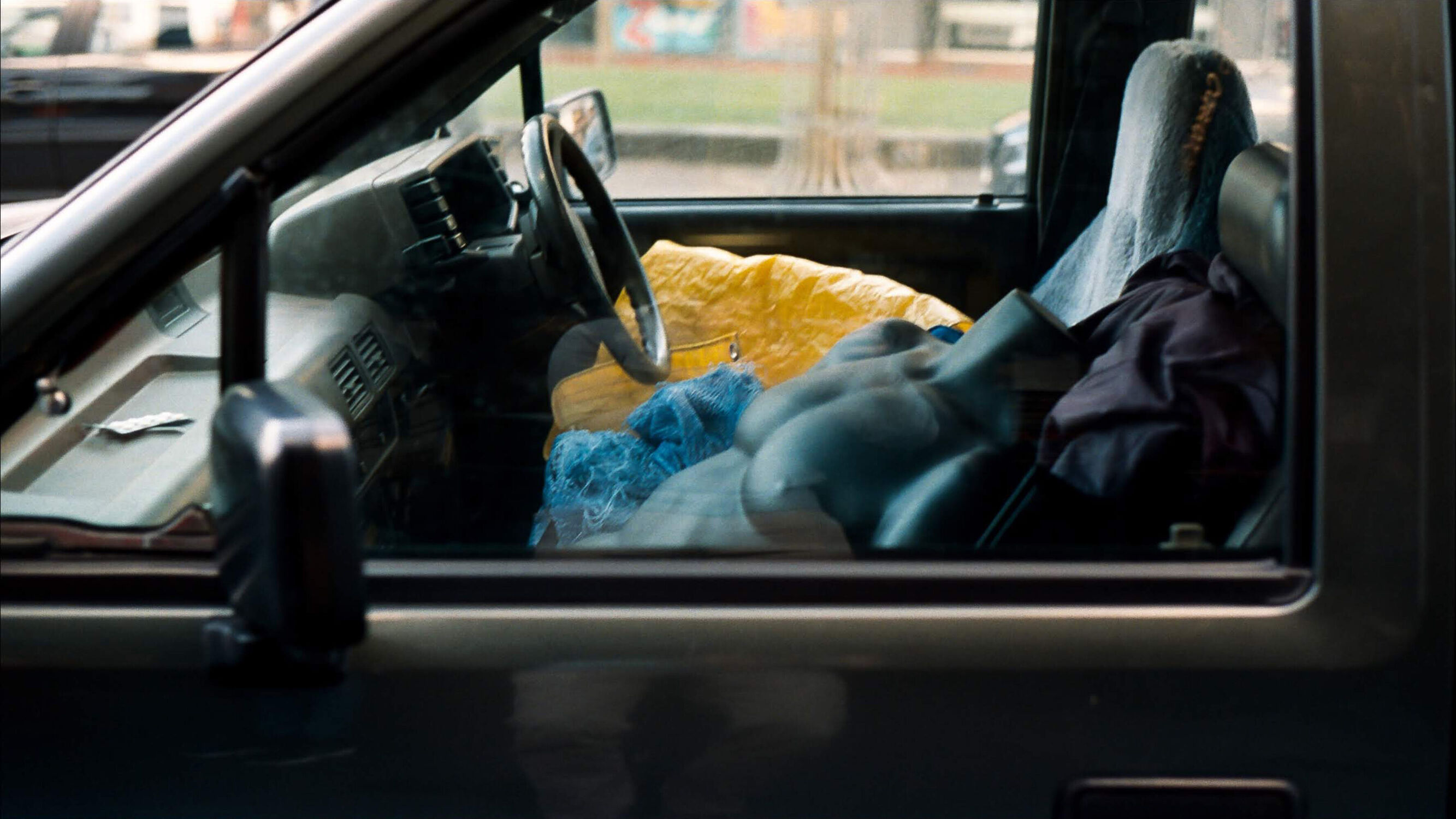 A manakin torso in the passengers seat